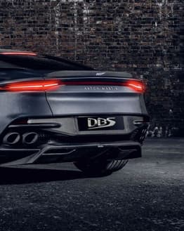 Aston Martin DBS-inspired Apple Watch face showcasing its bold rear profile with sleek taillights