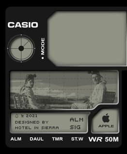 A Casio-inspired watch face featuring a grayscale photo display with two people, retro design elements, and "Designed by Hotel in Sierra" branding.