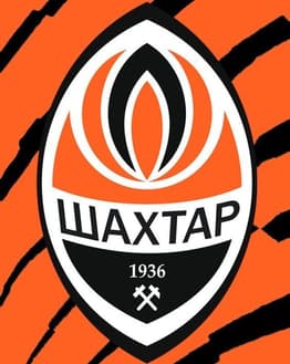 Shakhtar Donetsk football club crest with orange and black tiger stripes in the background, featured on a watch face