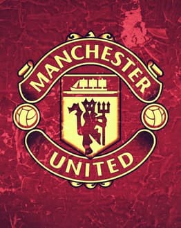 Manchester United football club crest with red and yellow accents, featured on a watch face