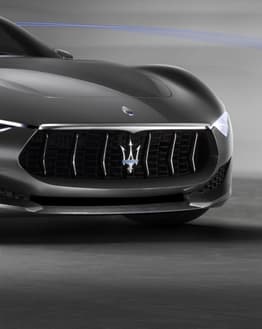Maserati front grille featuring the iconic trident logo on a sleek, high-performance car, used as a stylish watch face design.