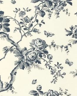 Intricate blue and white floral toile pattern with roses, vines, and butterflies, featured on a watch face.