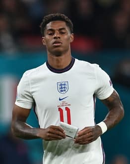 Image of Marcus Rashford in an England national team jersey, focused during a match, featured on a watch face.