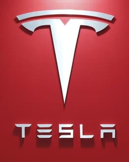 A Tesla-inspired watch face featuring a sleek modern design with stats for steps, heart rate, and battery level.