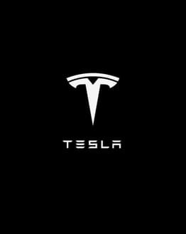 Tesla Black Signature watch face displaying the Tesla "T" logo on a black background with essential activity stats for steps, heart rate, and battery.