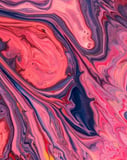 Apple-inspired watch face featuring a vibrant swirl design in pink, purple, and blue tones