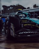 Aston Martin Formula 1-inspired Apple Watch face featuring the AMR23 racing car in British racing green
