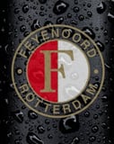 Feyenoord Rotterdam logo in red, white, and gold on a black textured background, featured on a watch face