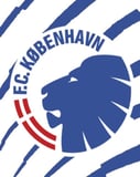 FC København logo featuring a bold blue lion with red and white accents, set on a watch face