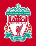 Liverpool FC crest featuring the Liverbird, "You'll Never Walk Alone" banner, and two flaming torches on a red background, displayed on a watch face