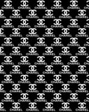 Coco Chanel repeated "CC" logo and "Chanel" text pattern in white on a black background, displayed on a watch face