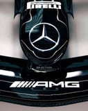 A watch face featuring the Mercedes-Benz logo and AMG branding on a sleek black Formula 1 car design.