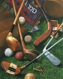 A watch face featuring vintage golf equipment, including wooden clubs, old-style golf balls, and accessories on grass.