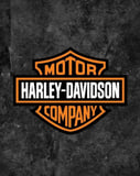 Harley-Davidson shield logo in orange and black on a rugged dark textured background, displayed on a watch face.