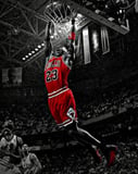 Iconic image of Michael Jordan performing a slam dunk in his Chicago Bulls jersey, set against a dramatic black-and-white basketball arena, featured on a watch face.
