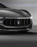 Maserati front grille featuring the iconic trident logo on a sleek, high-performance car, used as a stylish watch face design.
