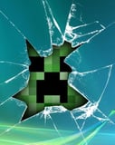 Minecraft Creeper bursting through cracked glass with a pixelated design, featured on a watch face.
