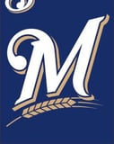 Milwaukee Brewers watch face displaying the team’s iconic “M” logo with wheat design on a bold navy background.