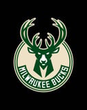 Milwaukee Bucks logo with a green and cream deer emblem, displayed on a watch face.