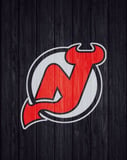 New Jersey Devils logo with a dark wood-textured background, featured on a watch face.