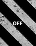 Off-White watch face with black diagonal stripes, "OFF" text, and a textured brick wall background.