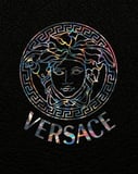 Versace Medusa logo in a holographic design over a black leather-textured background, featured on a stylish watch face